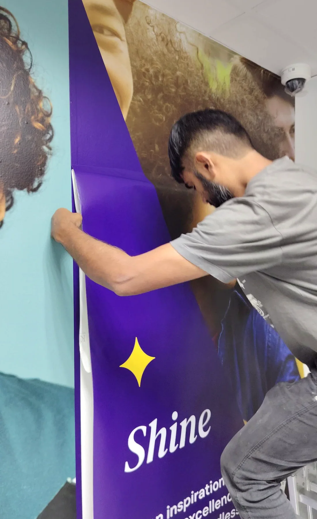 Wall graphics installation in progress