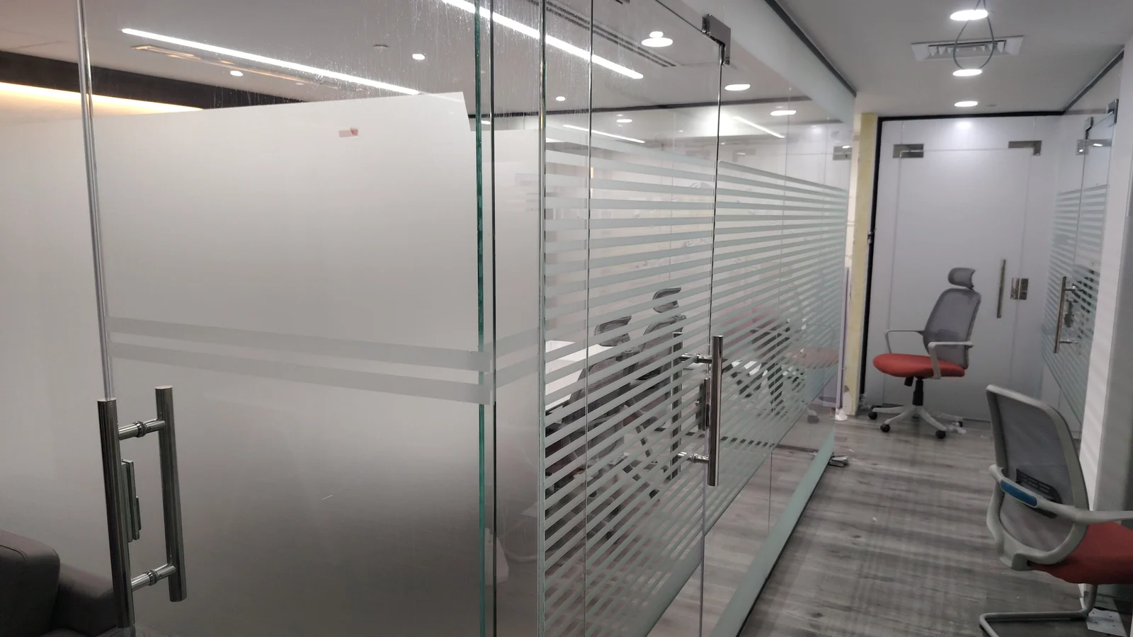 Finished frosted glass graphics in an office