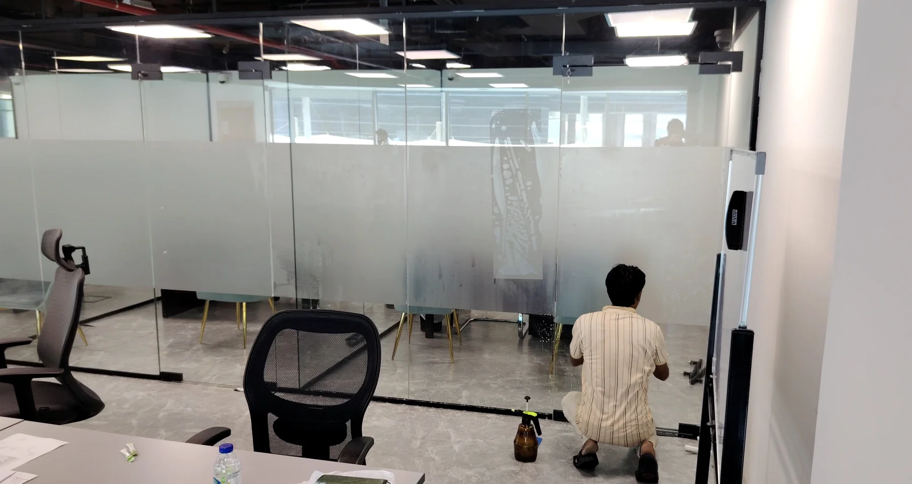 Office frosted glass installation in progress